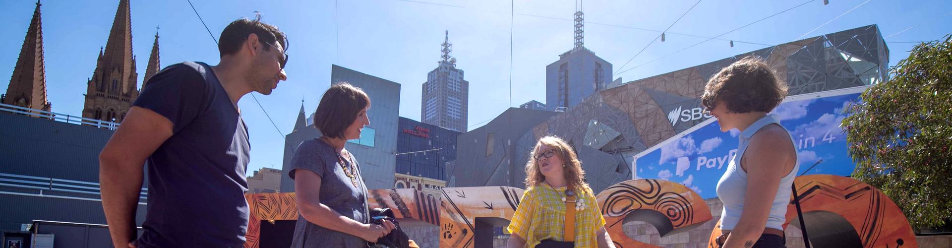 Guests on a Hidden Secrets walking tour of Melbourne Laneways