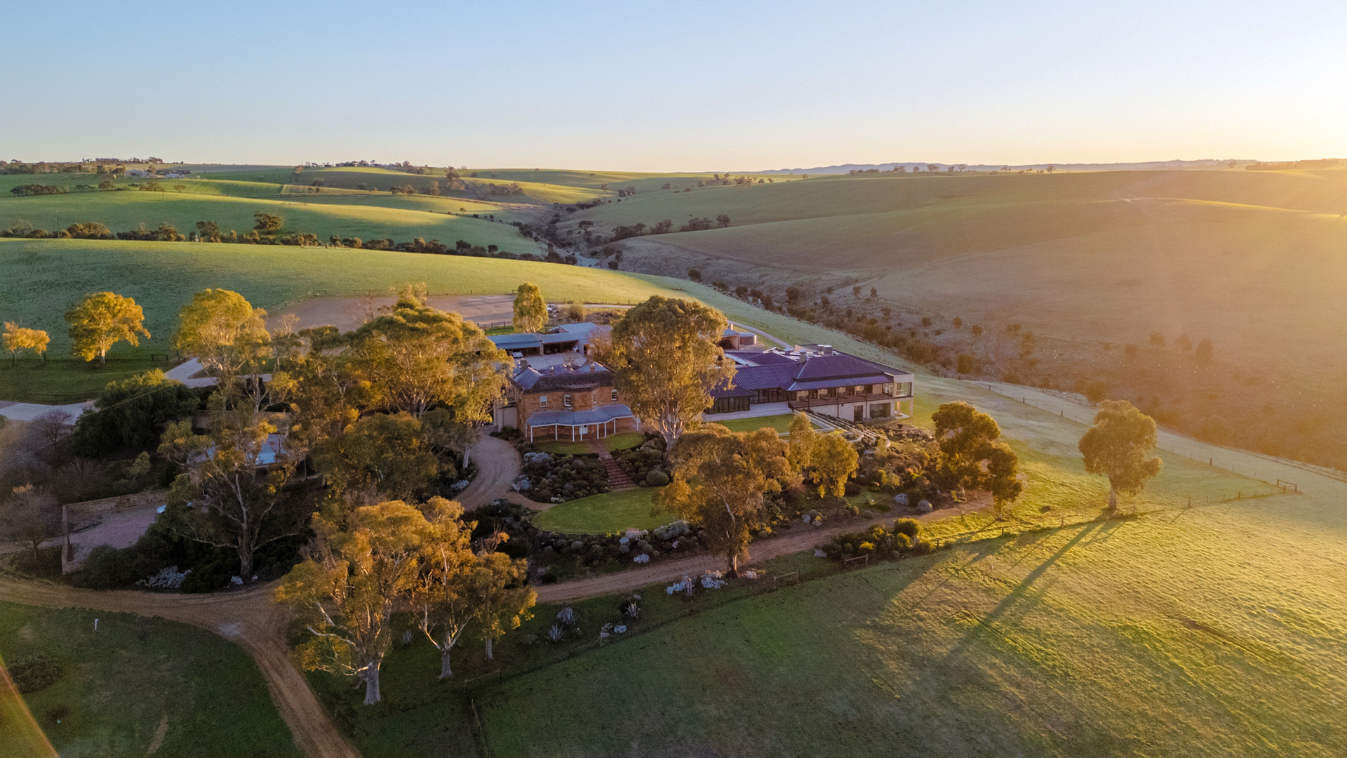 An aerial view of Kingsford Homestead at sunrise