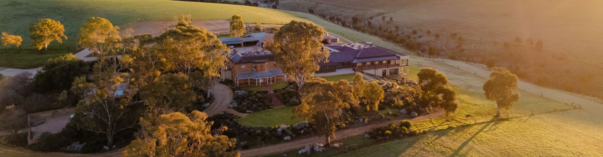 An aerial view of Kingsford Homestead at sunrise