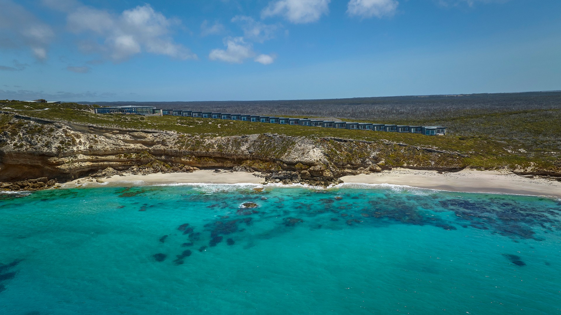 An aerial view from the water of Southern Ocean Lodge