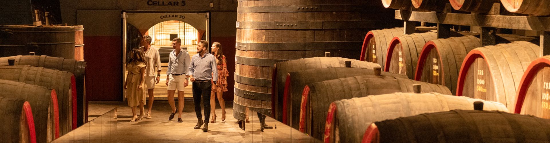 Viewing a barrel room with Ultimate Winery Experiences Australia