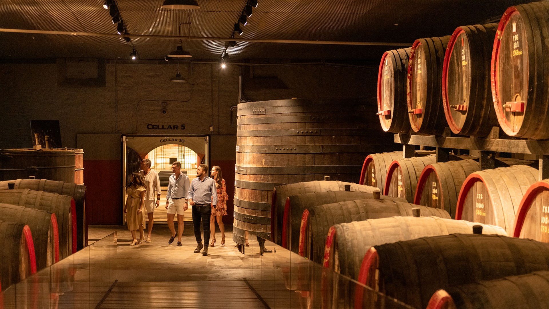 Viewing a barrel room with Ultimate Winery Experiences Australia