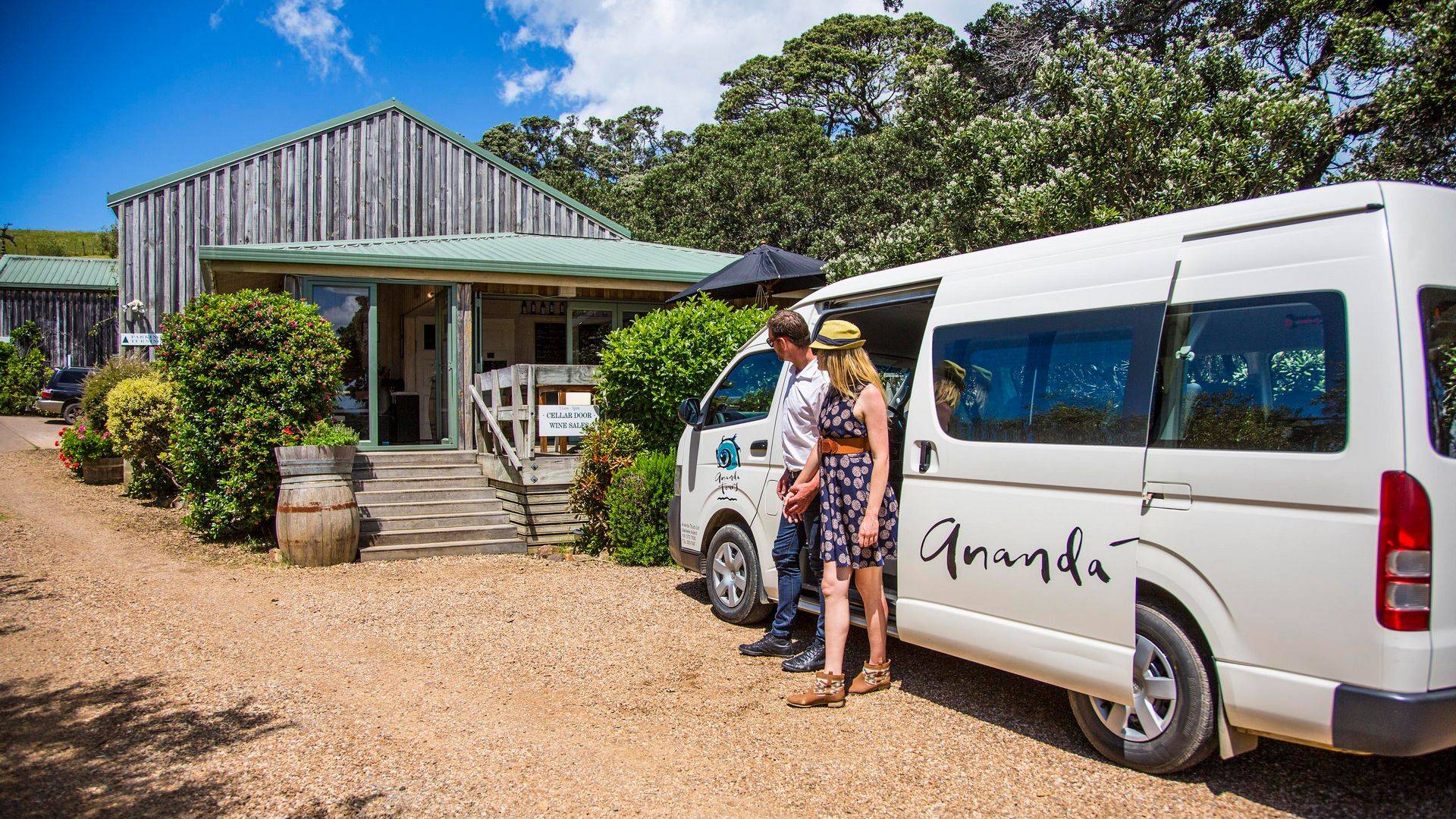 Guests arriving at a winery transported by Ananda Tours