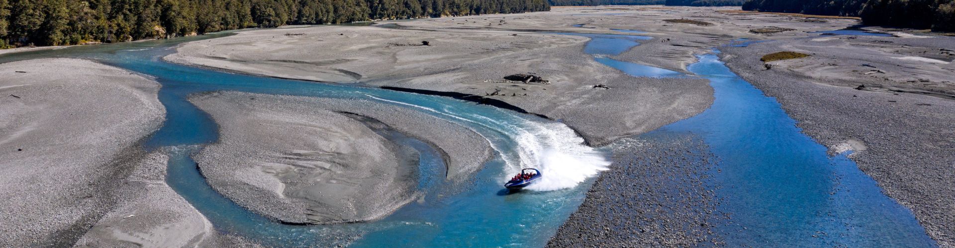 Jetboating on braided, glacier-fed rivers with Dart River Adventures