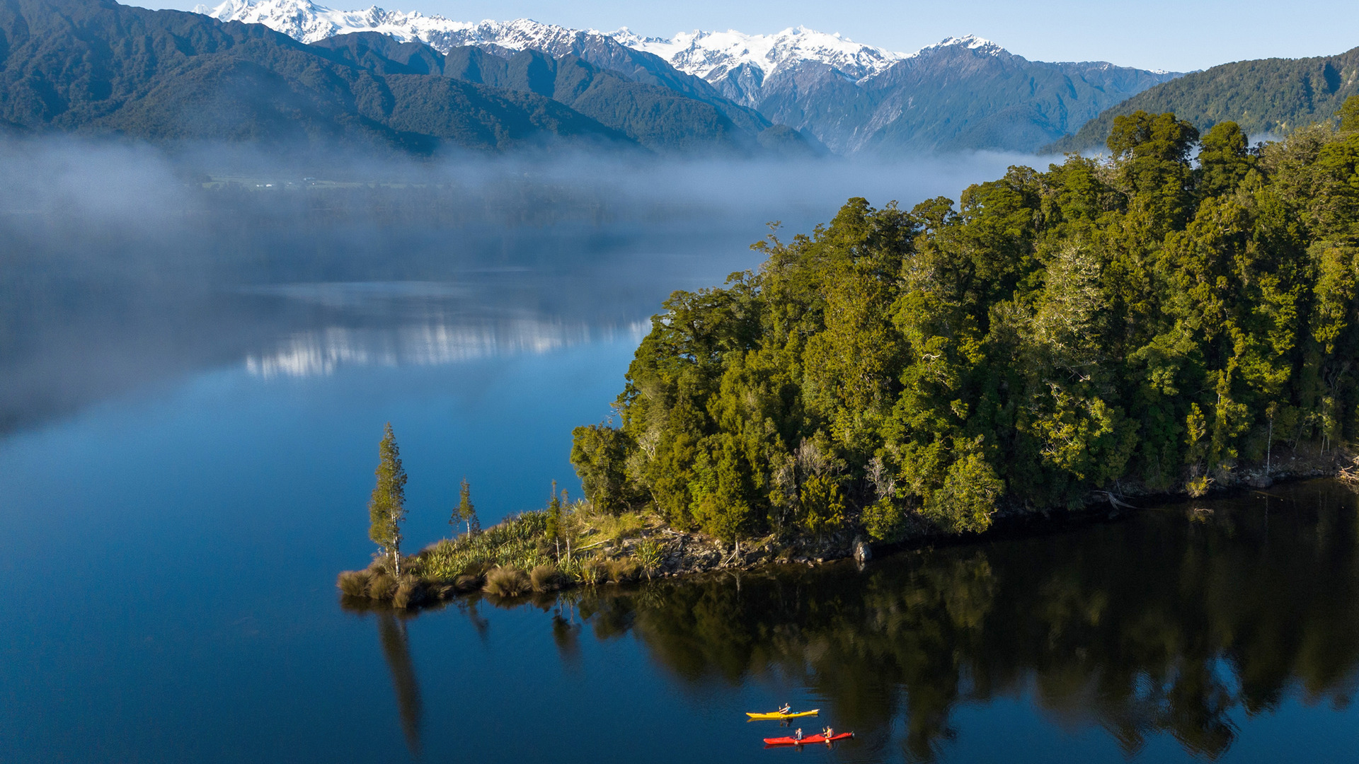 Kayakers on a Franz Josef Wilderness Tours