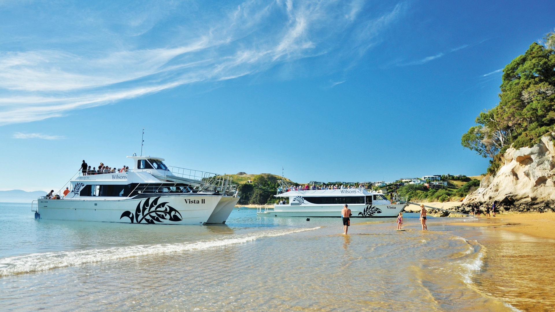 Guests arriving by boat with Wilsons Abel Tasman