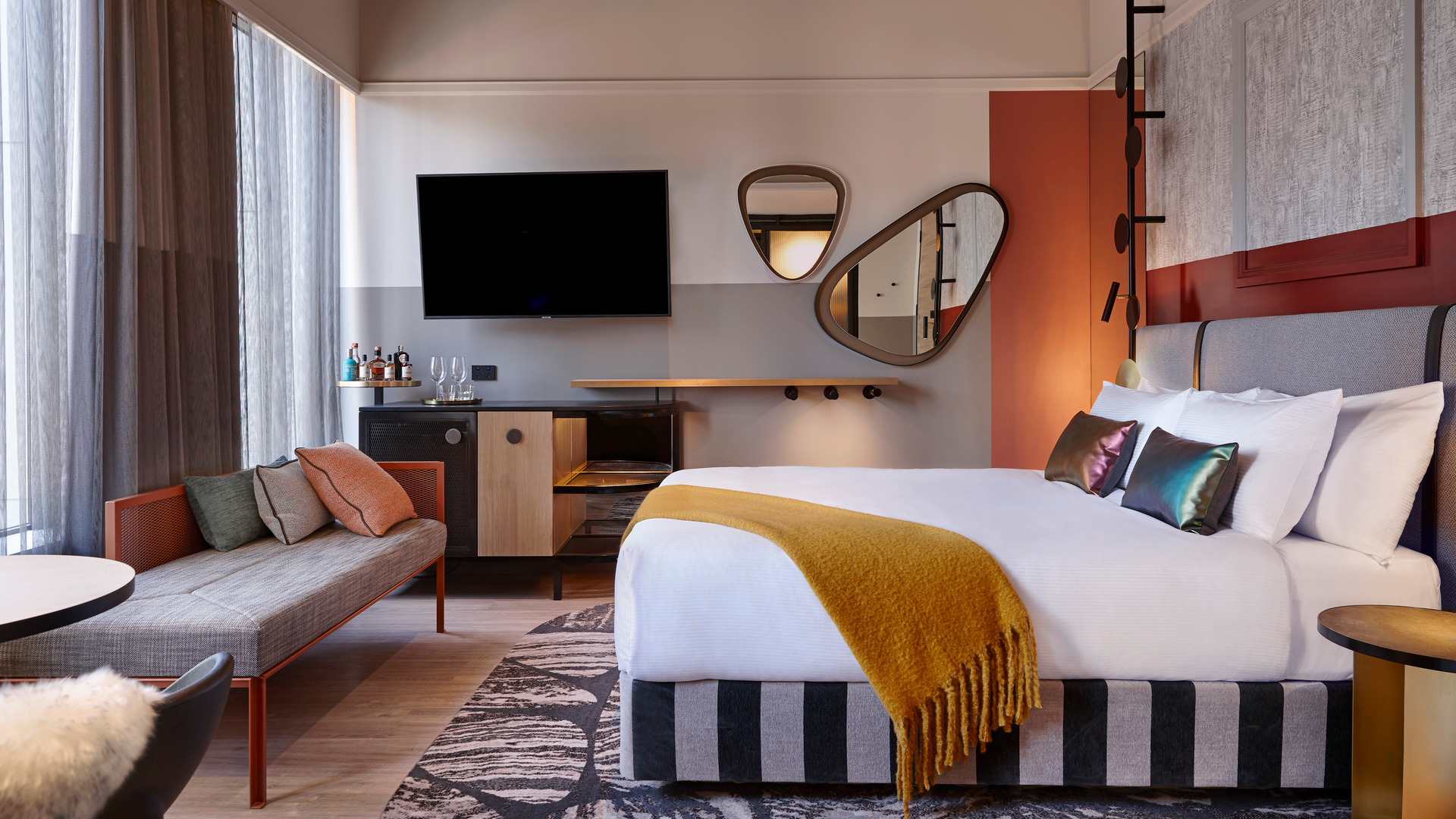 Comfortable and stylish guest room at QT Auckland
