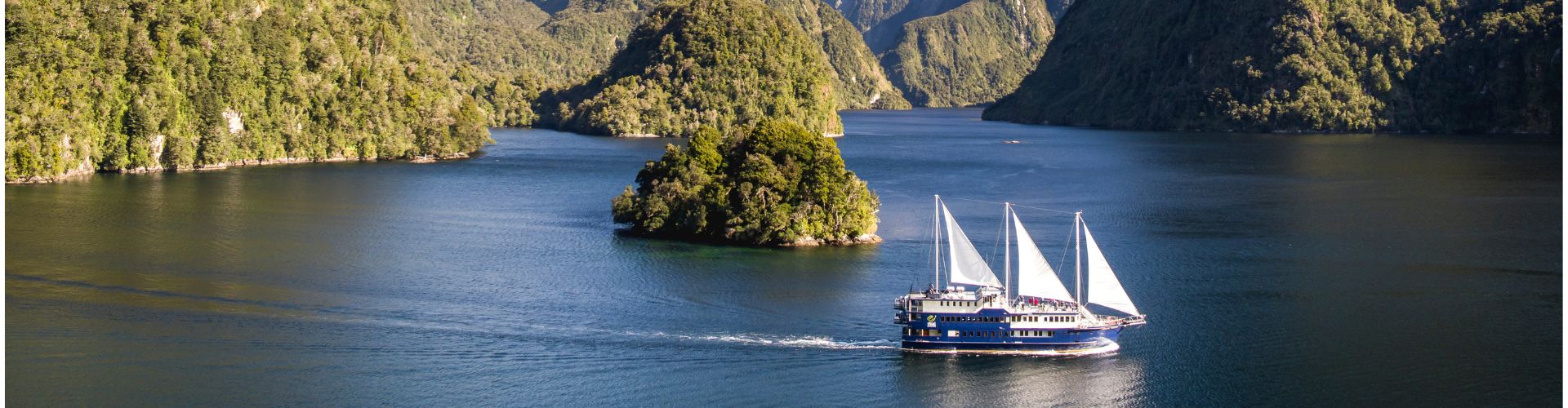 Spend the night surrounded by the untouched beauty of Fiordland with a RealNZ overnight cruise
